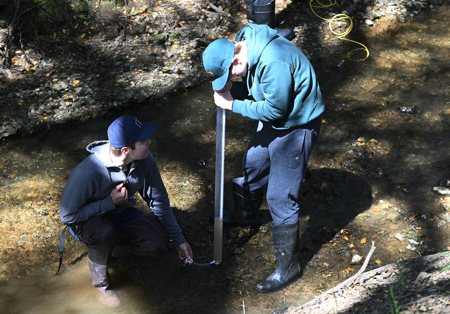 Benicia High School seniors Ryan Webb, right, and Robert St. Jacqes test the turbidity of Adler Creek as students check the health of the creek as part of a Solano County High School Biomonitoring Program in Vallejo on Wednesday. (Chris Riley/Times-Herald)