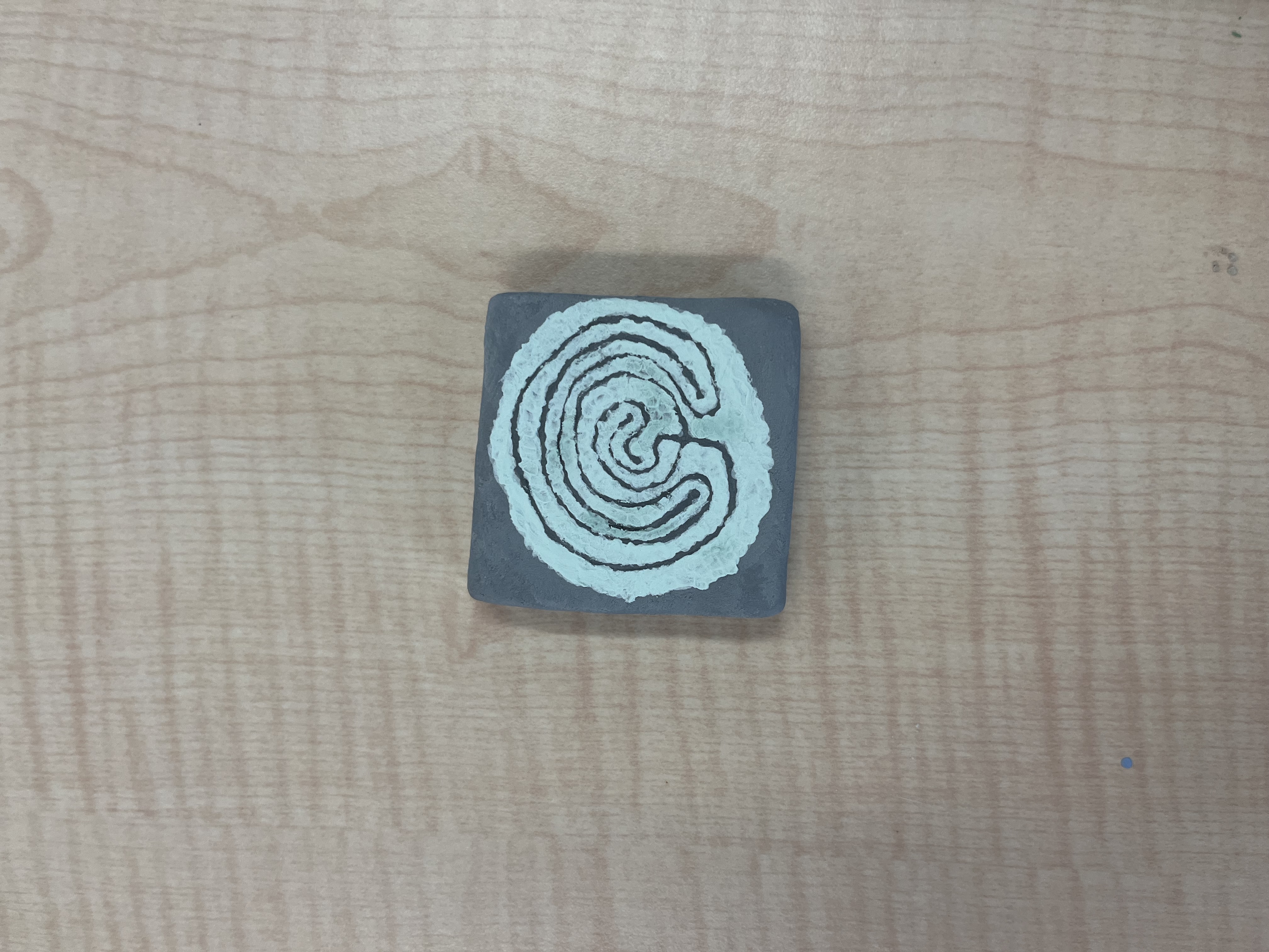 Unfired labyrinth tile